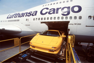 Illustration for article titled How Lufthansa gets the world's most exotic cars airborne